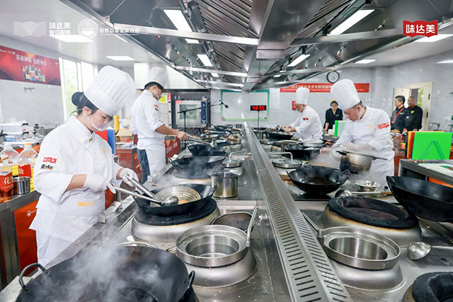 The contestants are cooking their dishes in kitchen 